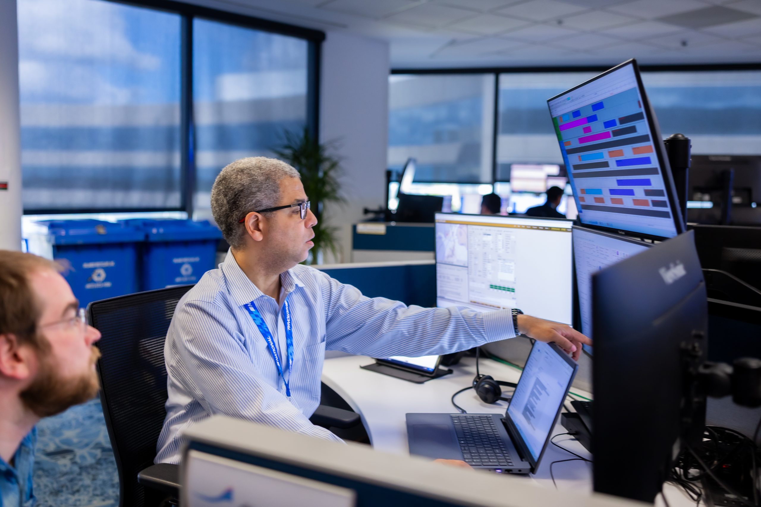 An office worker looking at a laptop