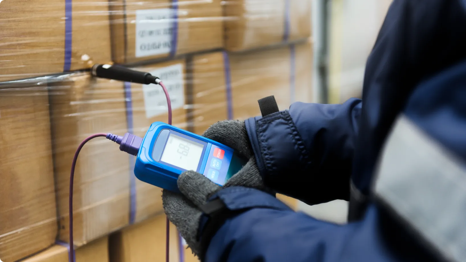 A person checking temperature of cargo